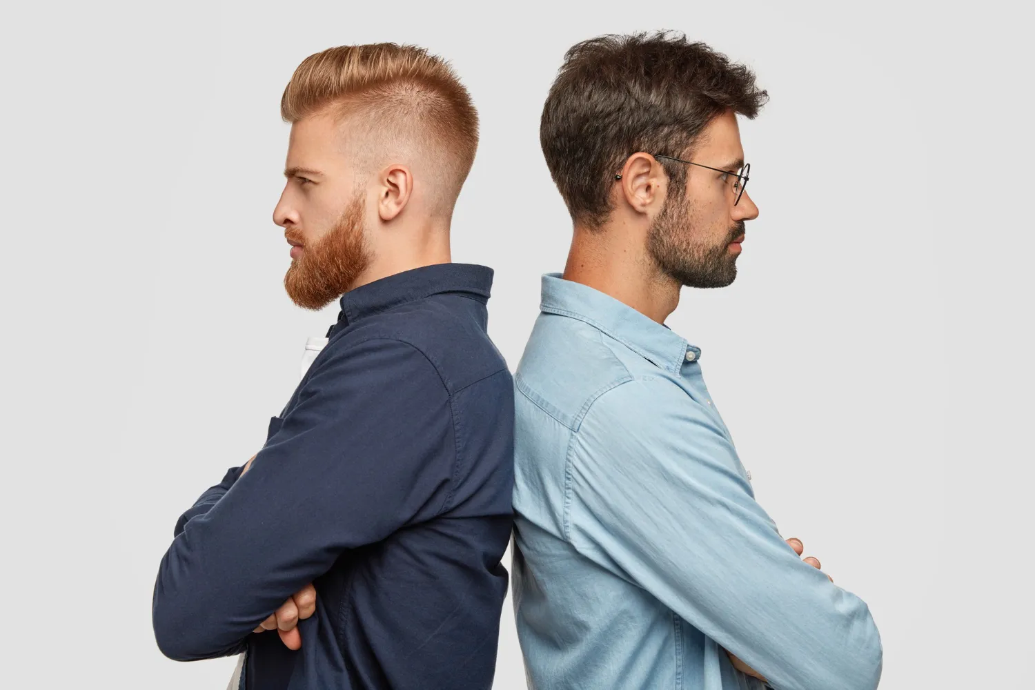 Side by side comparison of different fade and taper haircut styles showing low fade vs high fade variations