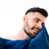 Professional low taper fade haircut example showing gradual hair transition and styling